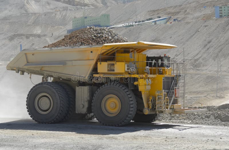 Powerful and huge truck loaded with copper mining. Powerful and huge truck loaded with copper mining