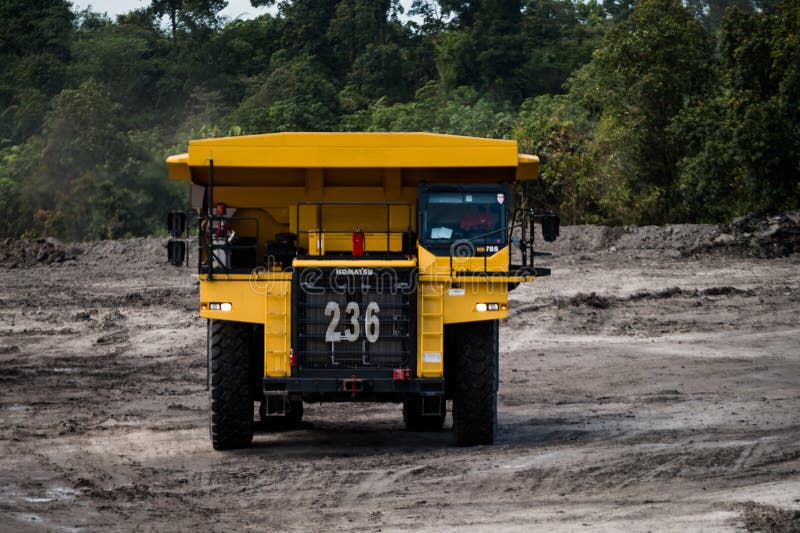 Mining truck mining machinery, to transport coal from open-pit as the Coal Production stock photos