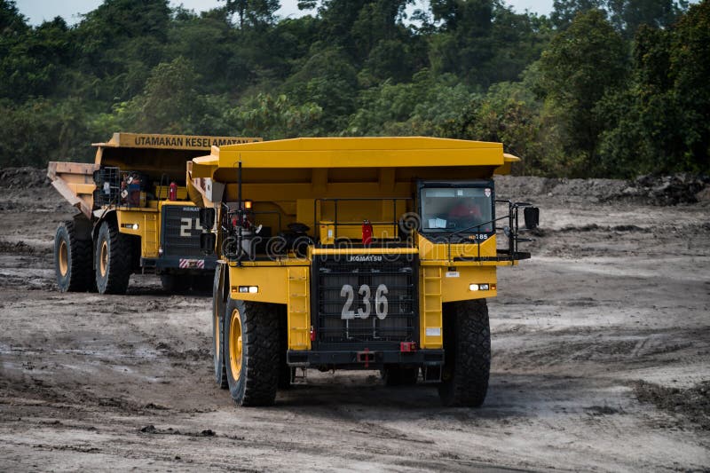 Mining truck mining machinery, to transport coal from open-pit as the Coal Production stock photo
