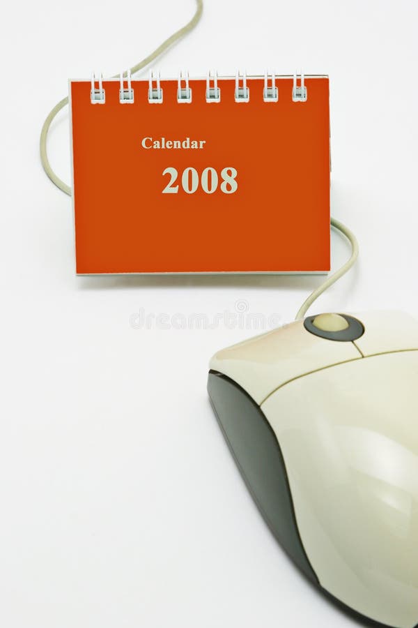 Minitischplattenkalender- und Computermaus stockbild Minitischplattenkalender- und Computermaus stockbild