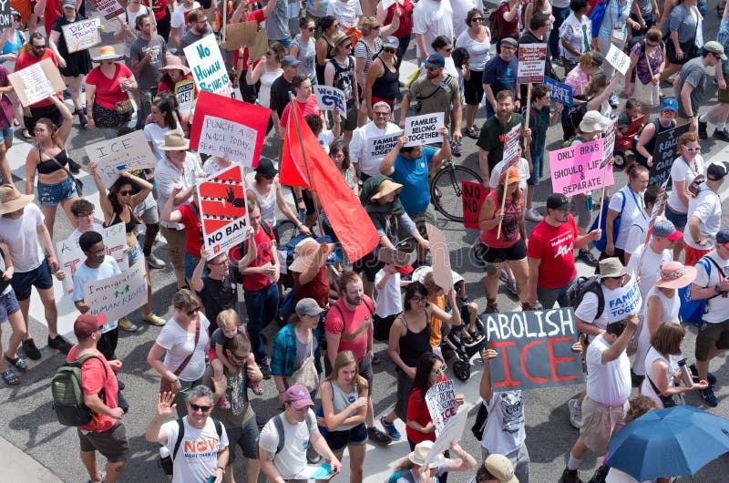 Streets Crowded with Protesters at Minneapolis Rally. Minneapolis, Minnesota, USA: JUNE 30, 2018: Protesters march in the streets to support the national rally stock image Streets Crowded with Protesters at Minneapolis Rally. Minneapolis, Minnesota, USA: JUNE 30, 2018: Protesters march in the streets to support the national rally stock image