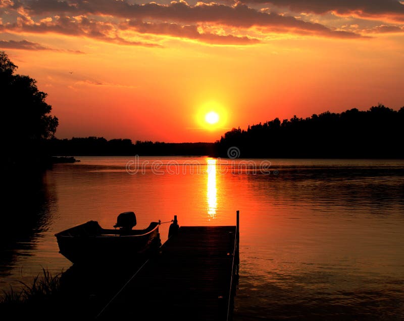 Minnesota lake sunset stock image. Image of hill, remote ...