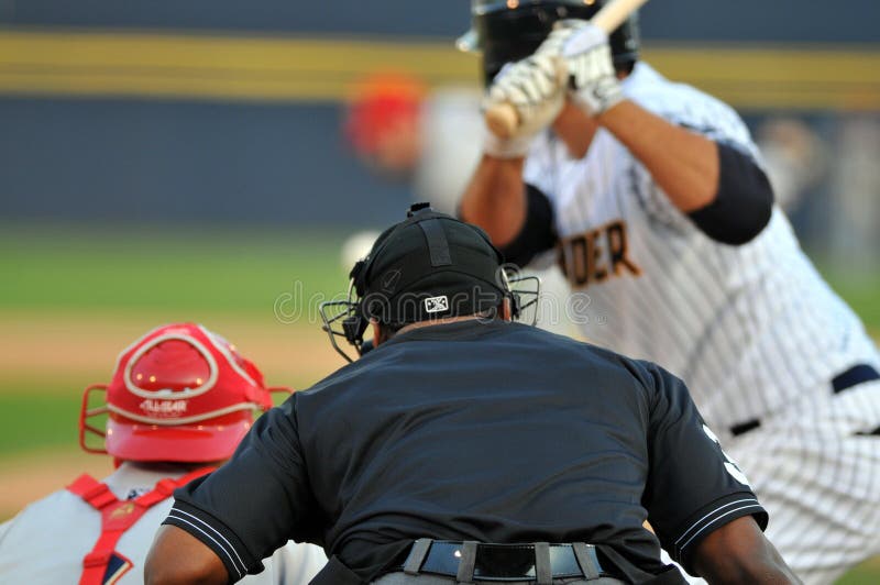 Minor League Baseball Umpire Watches the Pitch Editorial Photography