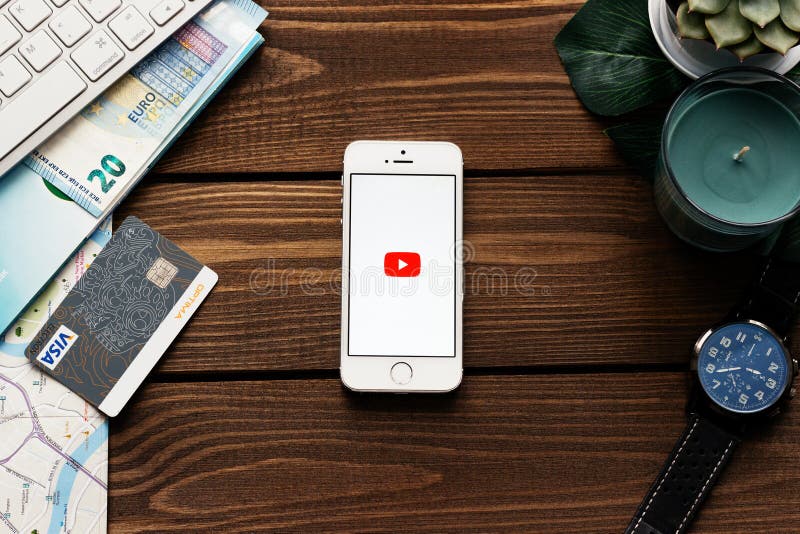 Apple Smartphone with Youtube Logo App. Flat Lay with Wooden Table  Background. Succulent Plant, Watch, Leaf of Monstera Editorial Stock Photo  - Image of apple, leaf: 112011978