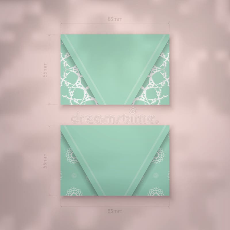 a-mint-colored-business-card-with-a-luxurious-white-ornamentation-for