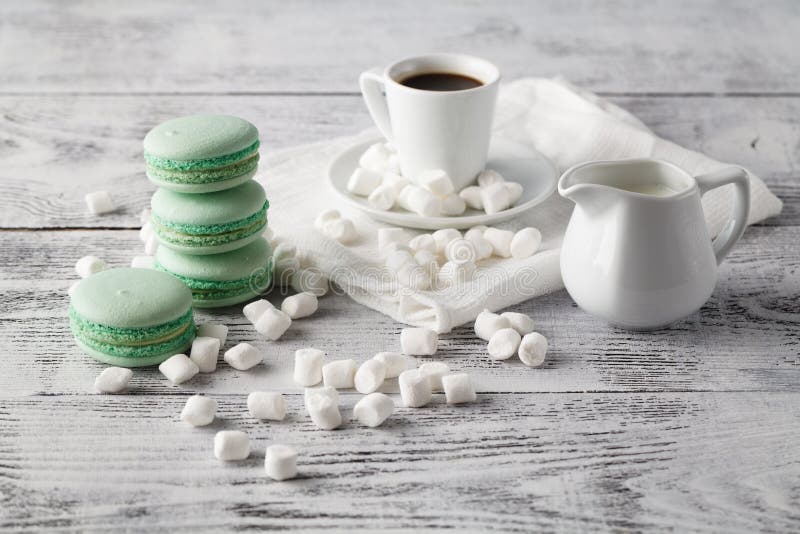 Mint cookies macaroon with milk and coffee.