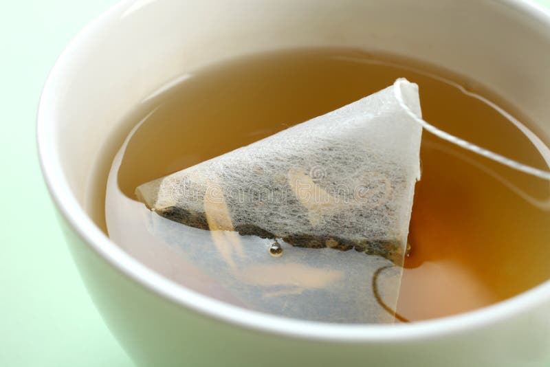 Mint tea bag in a cup stock image. Image of refreshing 111563017