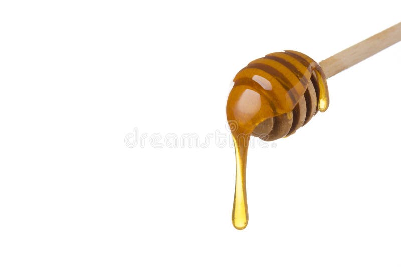 Miodowy obcieknięcie od drewnianej miodowej łyżki obraz royalty free Miodowy obcieknięcie od drewnianej miodowej łyżki obraz royalty free
