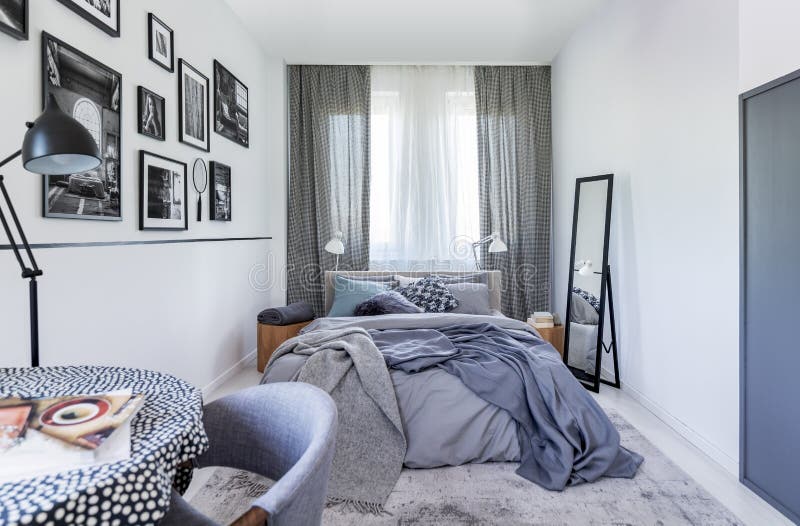 Mirror Next To Bed With Sheets In Bedroom Interior With ... Mirror Next To Bed With Sheets In Bedroom Interior With ... on Mirrors Next To Bed
id=48391