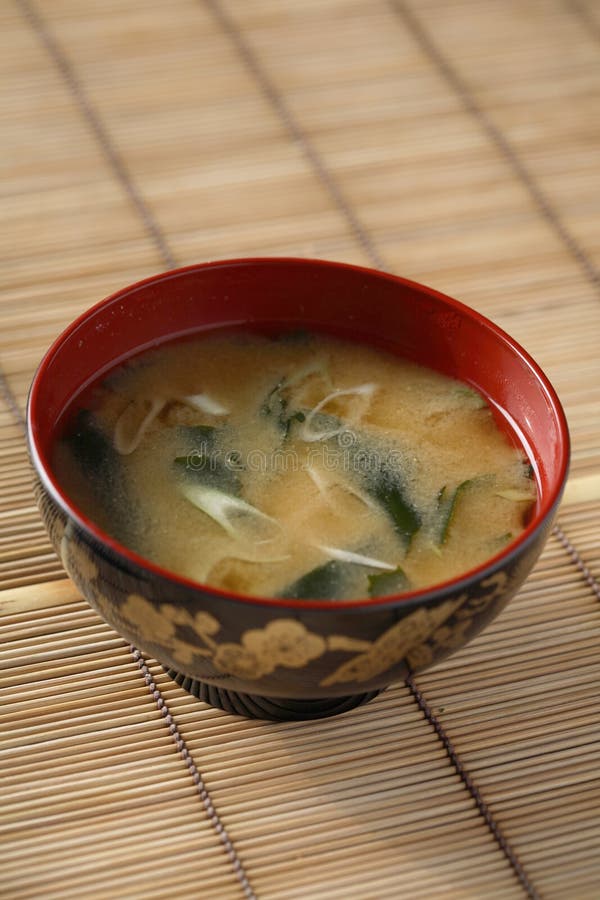 Miso Soup Miso Broth With Algae Wakame, Honey Agarics, Tofu Cheese And Leek Stock Photo