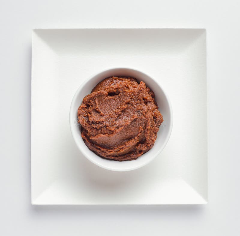 Miso paste in white bowl, overhead view. Miso paste in white bowl, overhead view