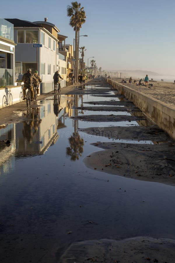 Mission Beach Broadwalk after Flooding with King Tide Waves. San Diego, January 6, 2023