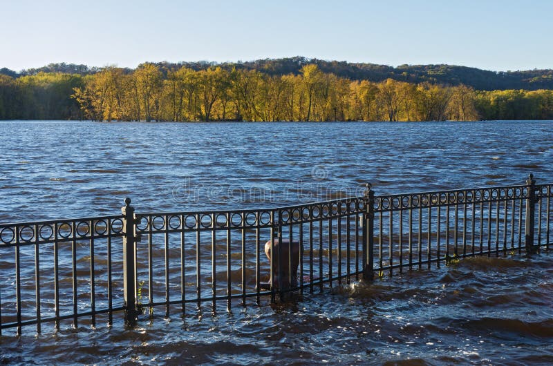 Mississippi River Autumn Horizon and Floodwater. Mississippi river and wooded banks from st feriole island during autumn flood in prairie du chien wisconsin royalty free stock photos Mississippi River Autumn Horizon and Floodwater. Mississippi river and wooded banks from st feriole island during autumn flood in prairie du chien wisconsin royalty free stock photos