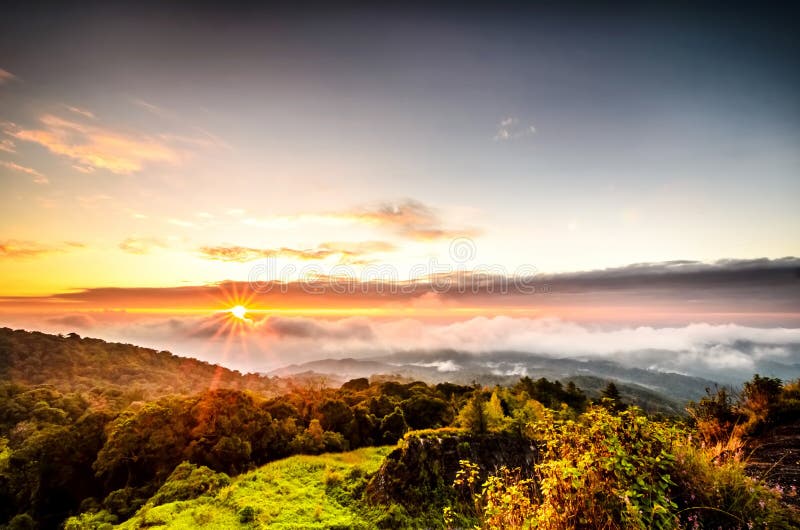 Mist with mountain on sunrise