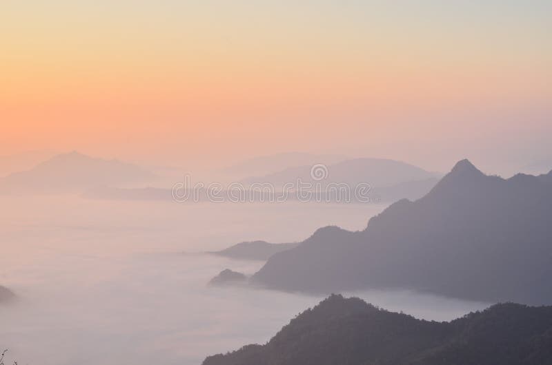 Mist before sunset between moutains