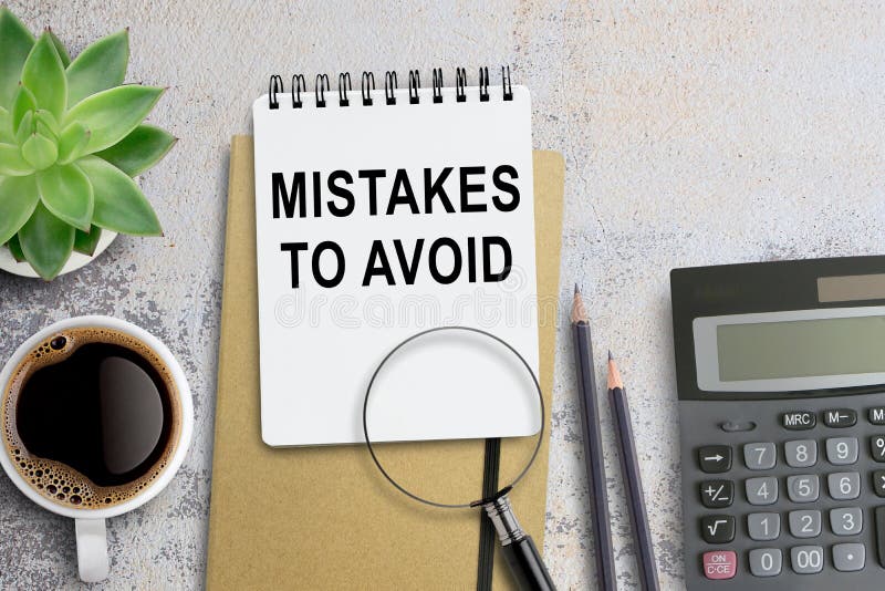 MISTAKES TO AVOID, Text on notebook in office desk workplace background