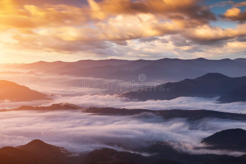 Misty dawn in the mountains. Beautiful landscape royalty free stock photos Misty dawn in the mountains. Beautiful landscape royalty free stock photos