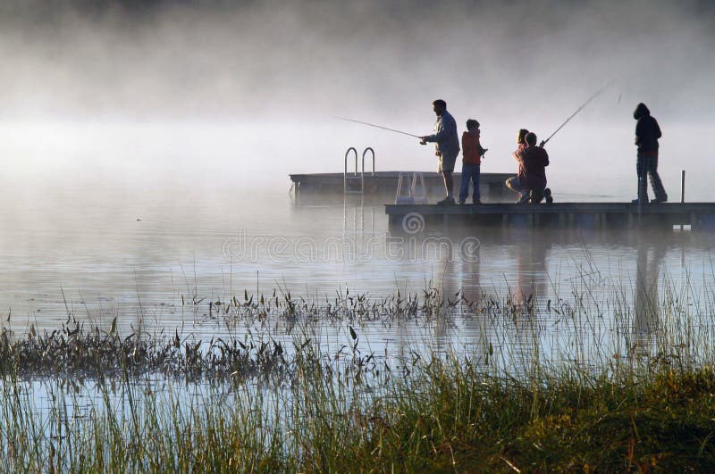 Misty Sunrise Fishing on Lake Stock Photo Image of sunset, water 5058628