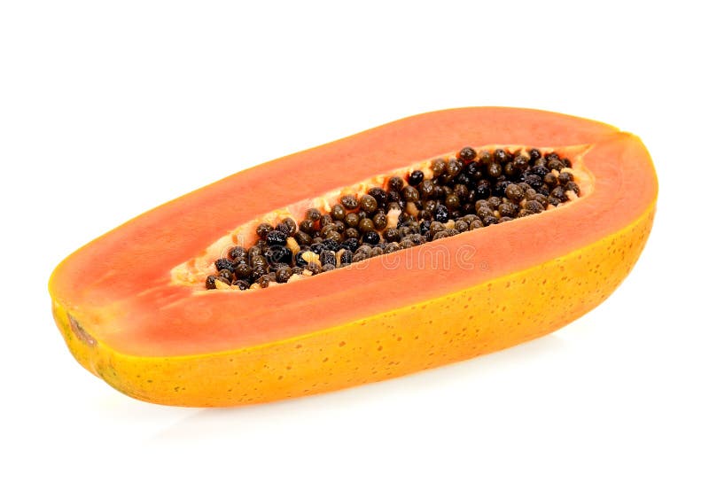 Mitad de la papaya aislada en el fondo blanco foto de archivo Mitad de la papaya aislada en el fondo blanco foto de archivo