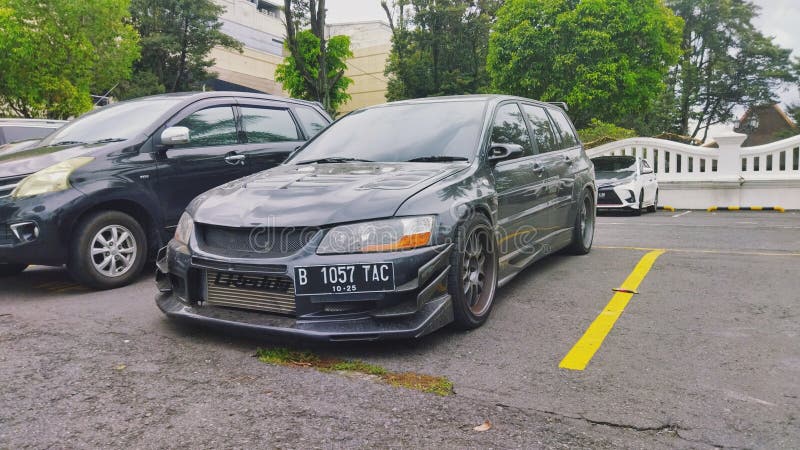 Yogyakarta Indonesia November 20 2021 Mitsubishi Lancer Evolution station wagon on parking lot royalty free stock photos
