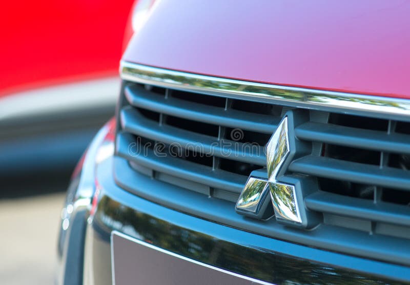 ROMANIA-SEPTEMBER 2 2017 Mitsubishi logo on September 2 2017 in ROMANIA, Logo of a Mitsubishi car displayed in a car show in Galat royalty free stock image ROMANIA-SEPTEMBER 2 2017 Mitsubishi logo on September 2 2017 in ROMANIA, Logo of a Mitsubishi car displayed in a car show in Galat royalty free stock image