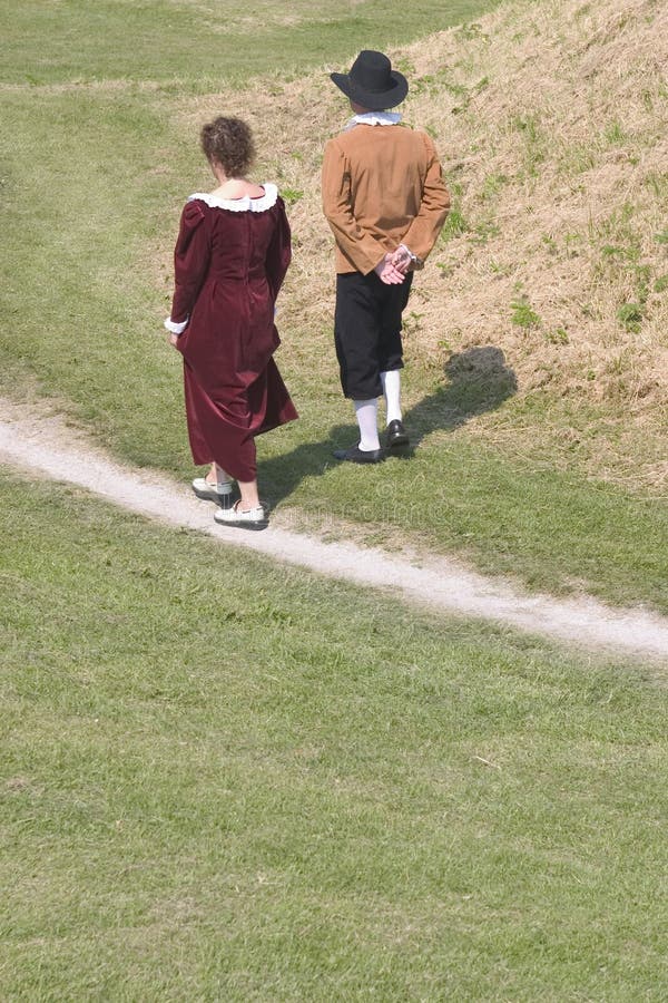 Man and woman strolling along. Big Yearly Festival in the Netherlands. Man and woman strolling along. Big Yearly Festival in the Netherlands.