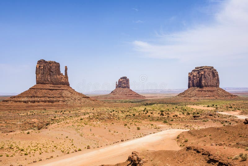 Mittens and Merric Butte are giant sandstone formation in the M stock image Mittens and Merric Butte are giant sandstone formation in the M stock image