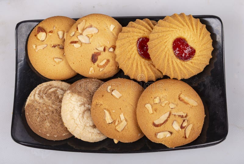Bakery Cookies on Black Dish. Stock Photo Image of placement, studio