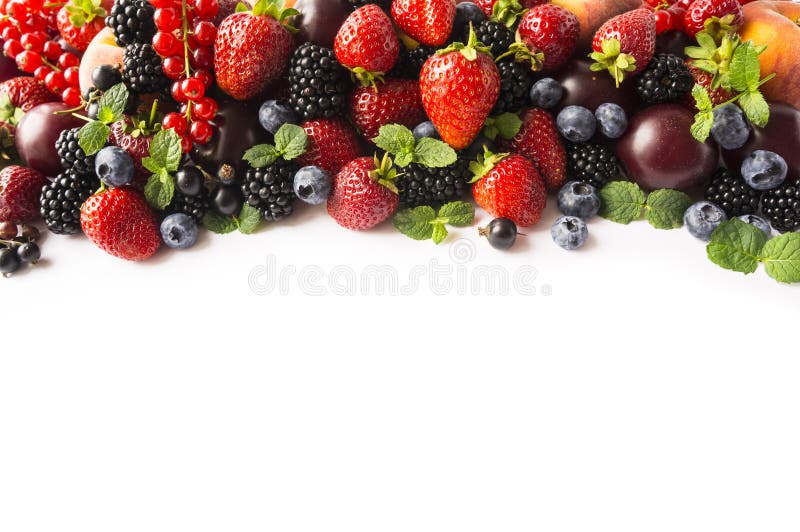 Mix berries isolated on a white. Berries and fruits with copy space for text. Black-blue and red food. Ripe blackberries, blueberr