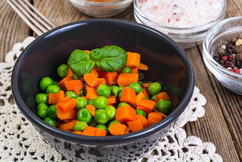 Boiled Vegetables, Fries and Meat for a Hearty Dinner Stock Photo