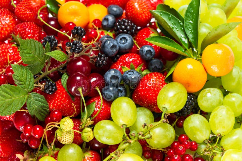 Mix of fresh fruits and berries. raw food ingredients stock photos Mix of fresh fruits and berries. raw food ingredients stock photos