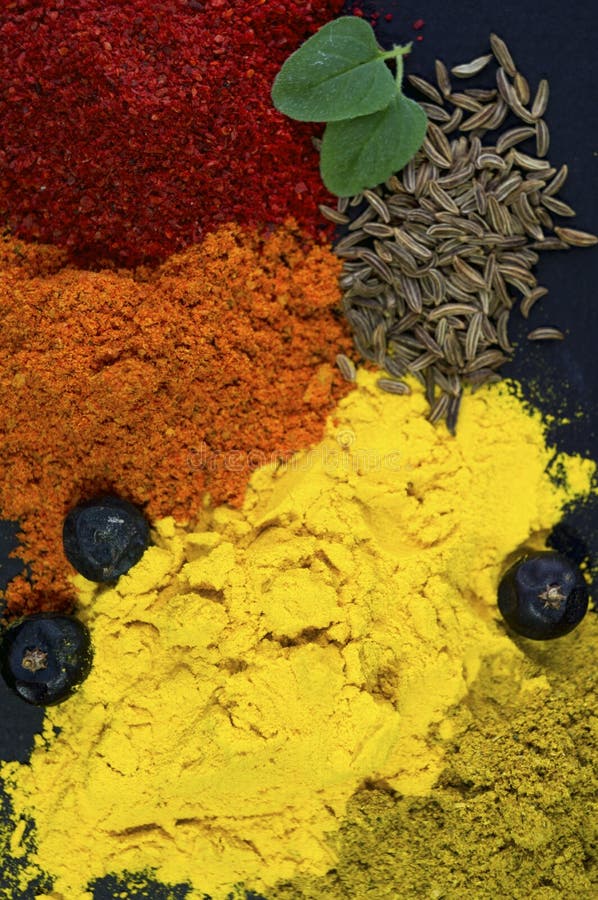 Mix of Spices on Dark Background. Tumeric, Paprika Stock Photo Image