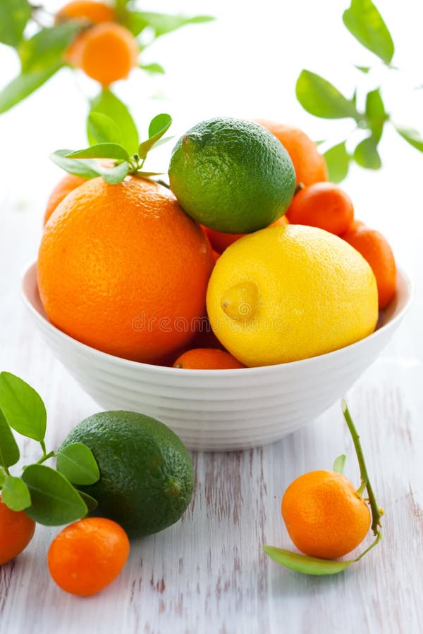 Bowl of fresh citrus fruits on the table. Bowl of fresh citrus fruits on the table