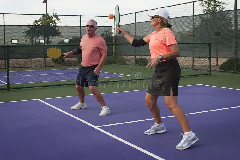 Mixed Doubles Pickleball Action - Forehand for the Point