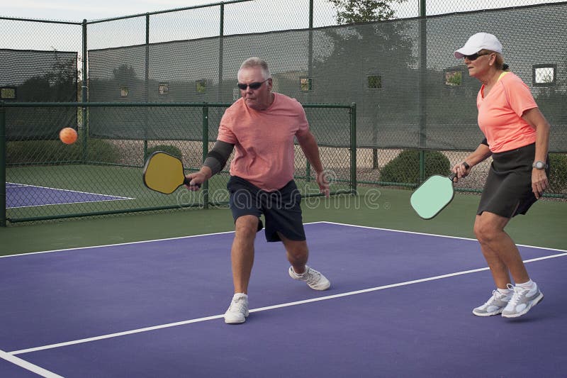 Mixed Doubles Pickleball Action - Smooth Backhand