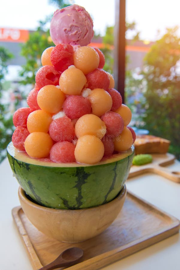 Mixed Fruit with Sweetened Condensed Milk on Ice Cream Stock Image