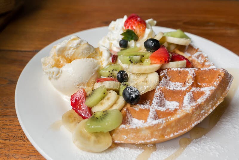 Mixed fruits waffle stock photo. Image of kiwi, caramel 78061866
