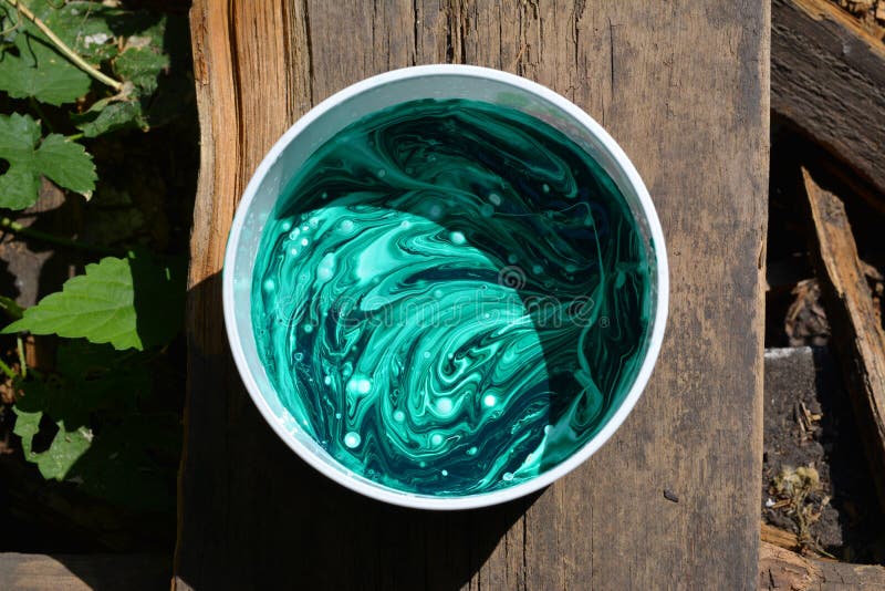 Mixed Green Acrylic Colors in Plastic Box. Fluid Art Stock Image