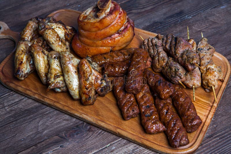 Mixed Grilled Meat Platter. Assorted Delicious Grilled Meat Stock Photo