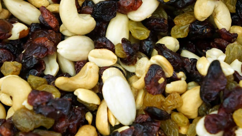 Peanuts Mixed Dried Shelled Fruit and Dried Tomatoes in White Container ...