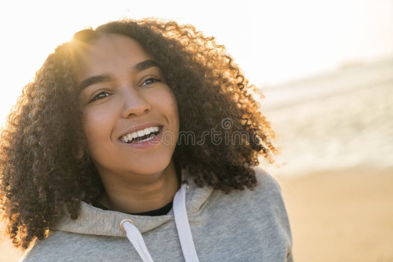 Mixed Race African American Girl Teenager Smiling Sunset Beach St