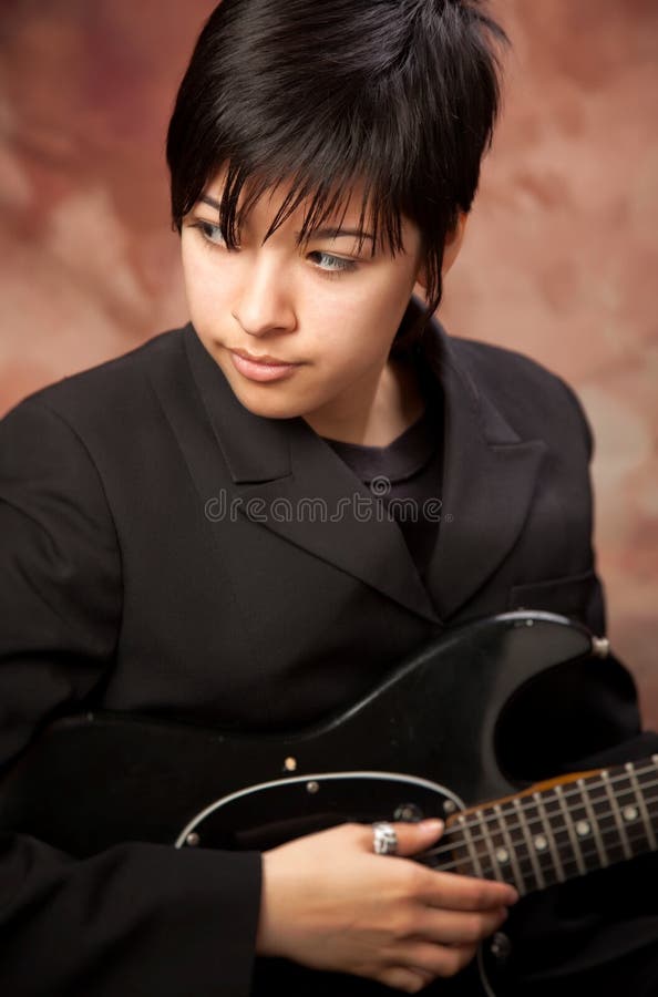 Stylish Young Man Hat Posing Acoustic Guitar While Sitting Chair Stock  Photo by ©AndrewLozovyi 231621264