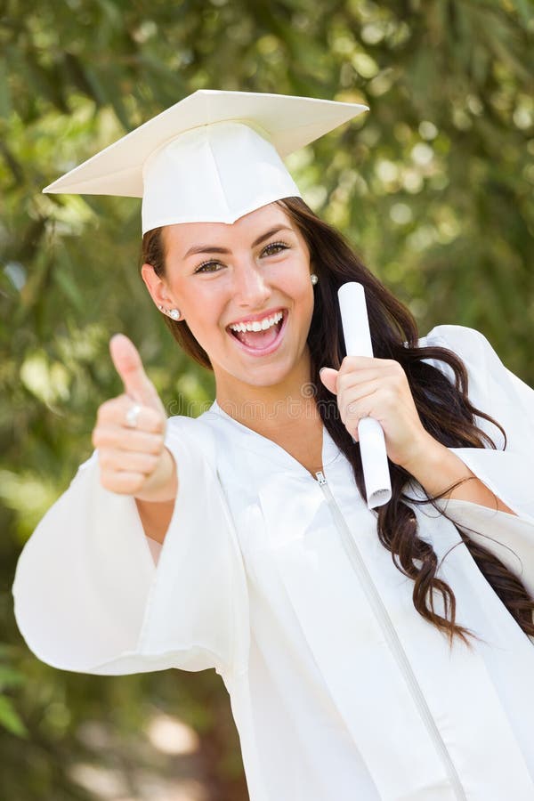 Mixed Race Teen Girl Celebrating Graduation in Cap and Gown Stock Image -  Image of hair, celebrating: 122541333