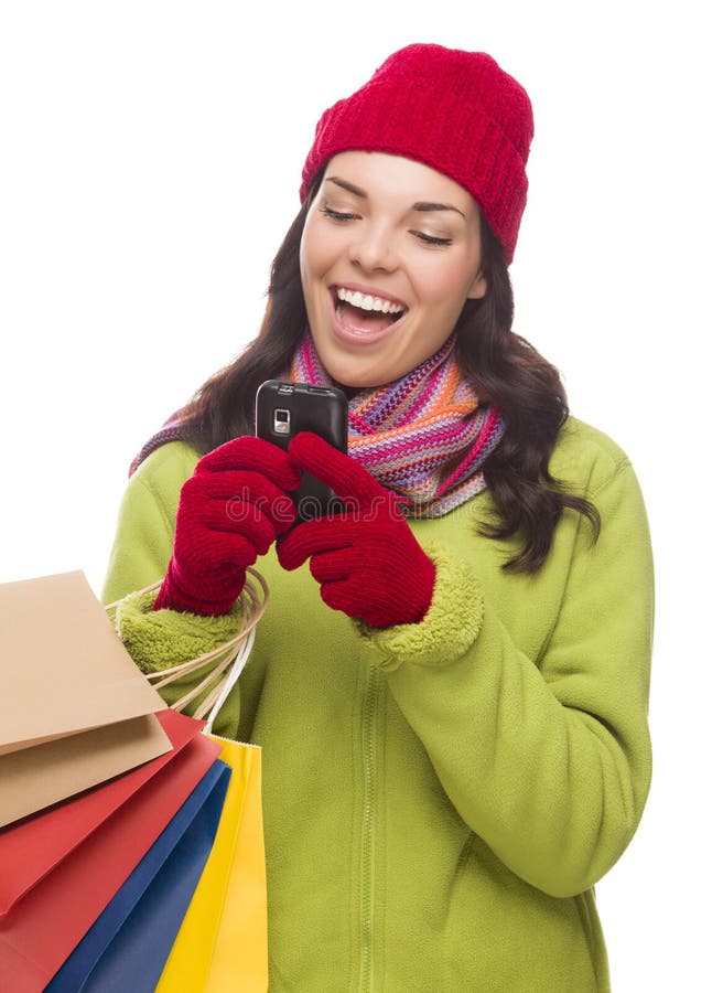 Mixed Race Woman Holding Shopping Bags Texting On Cell Phone