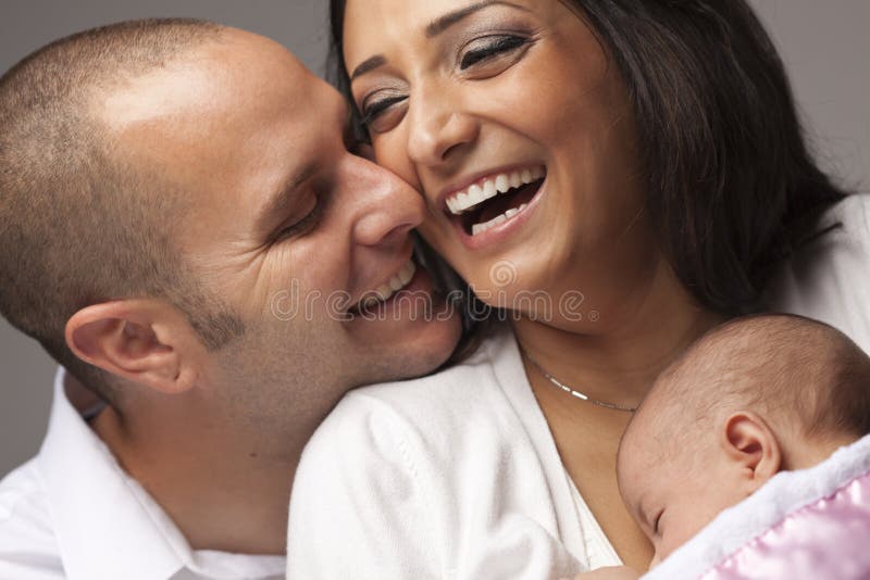 Mixed Race Young Family with Newborn Baby