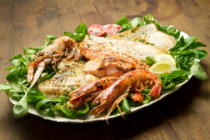 Mixed seafood grill stock photo. Image of bass, food 32201442