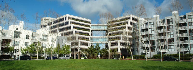 Modern office building part of mixed use development at center of residential development in Silicon Valley, California