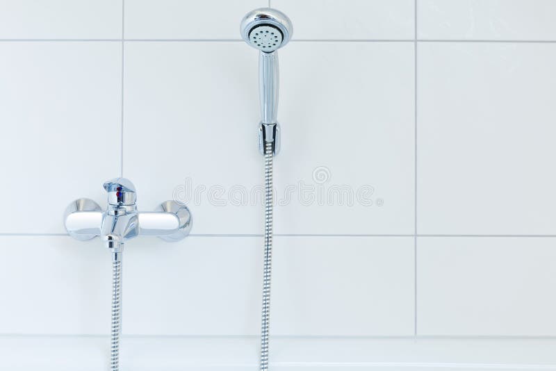 Mixer tap and shower head stock photo. Image of flagging 37770454
