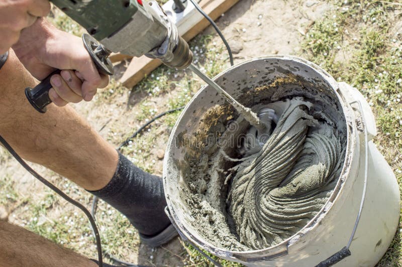 Mixing Glue With A Power Drill Stock Image - Image of color, glove