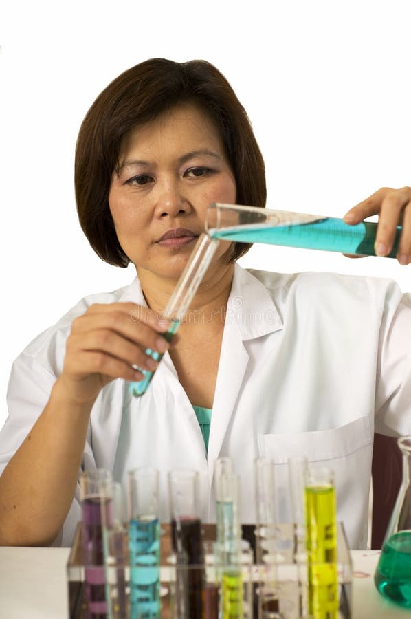 Mixing chemicals stock image. Image of asian, chemist 10798397
